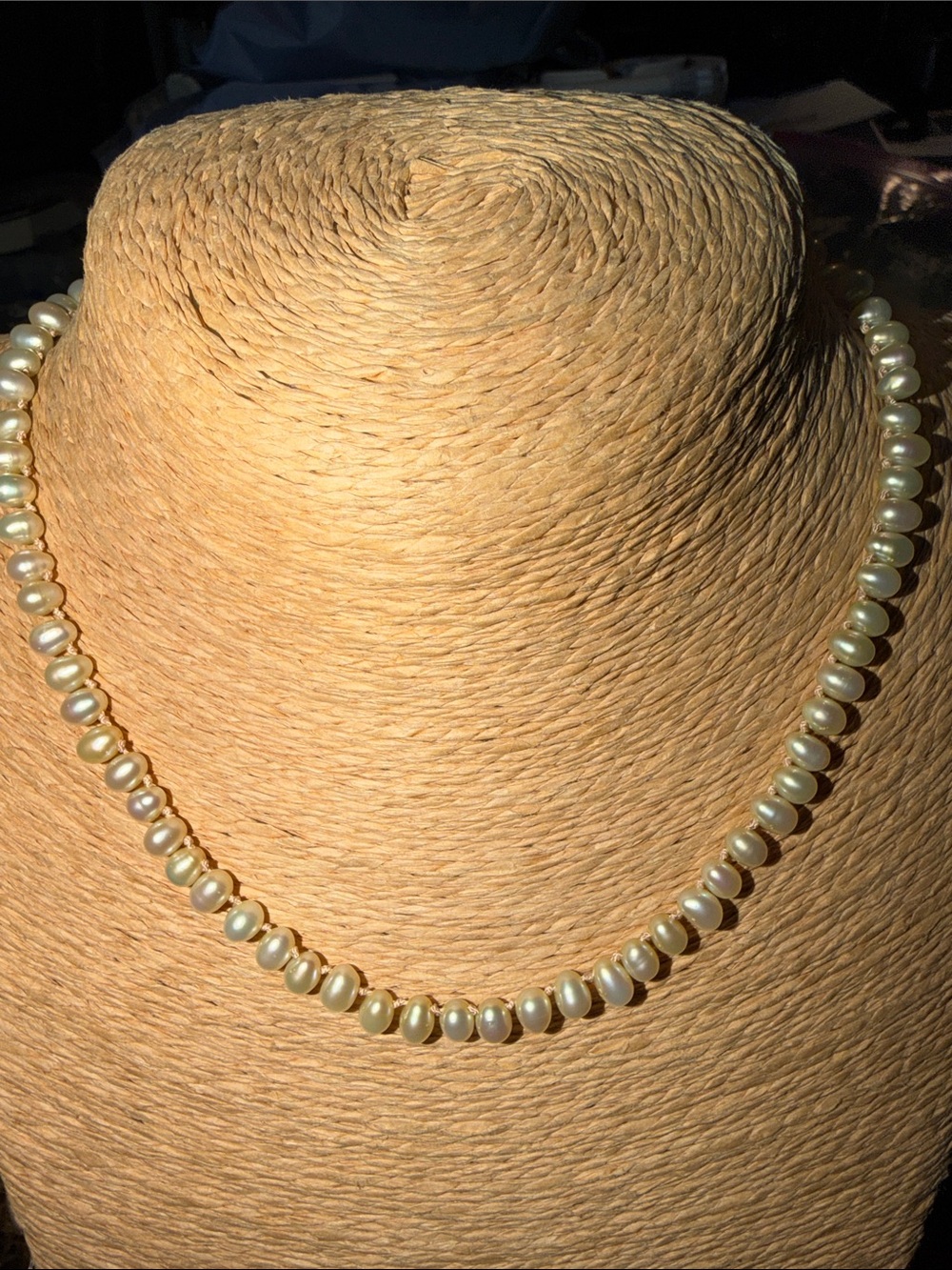 Champagne colored teardrop shaped fresh water pearls hand knotted on silk